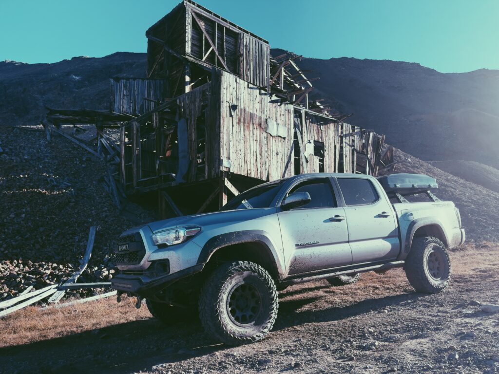 Tacoma Overlander in Colorado driving past an abandoned mine near Mosquito Pass.