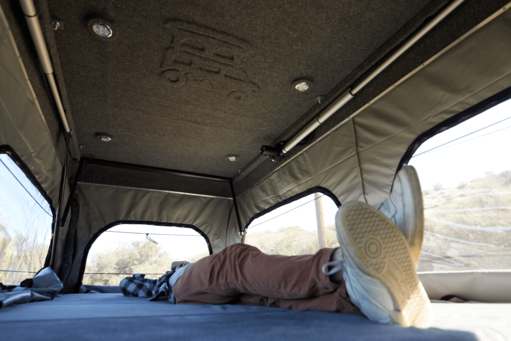 laying down in the escaper campervan del mar