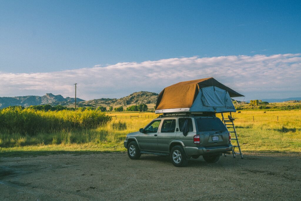 overland vehicle with a rooftop tent