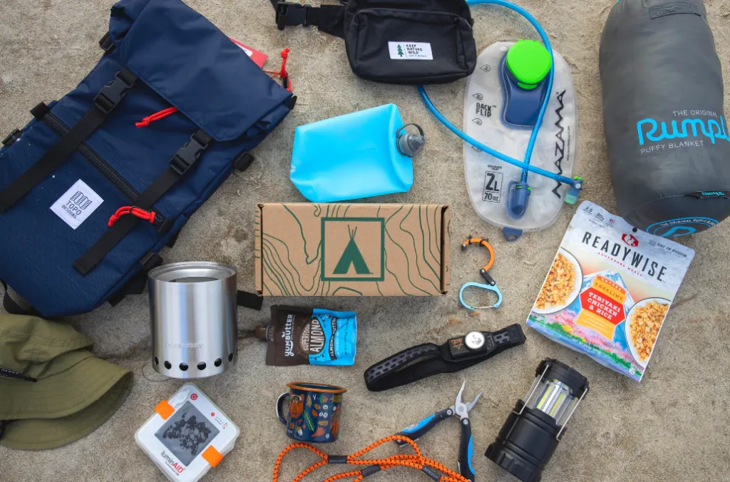 The Nomadik Outdoor Subscription Box: showcases some of the brands and items you would receive.